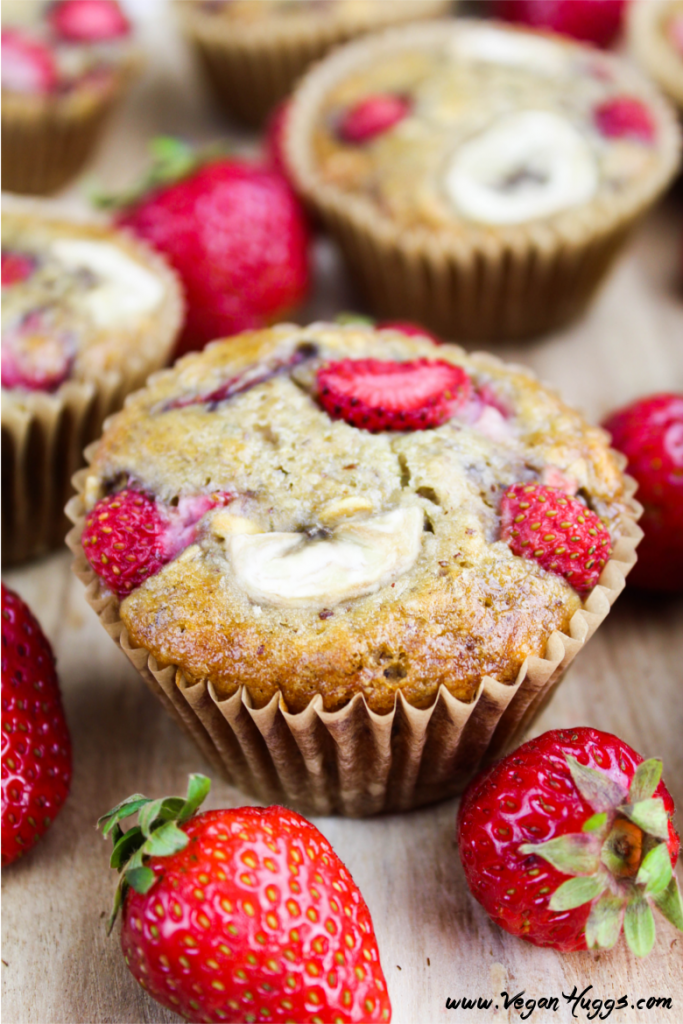 Side view of muffins on a cutting board.