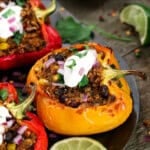 side view of quinoa stuffed peppers on a comal.