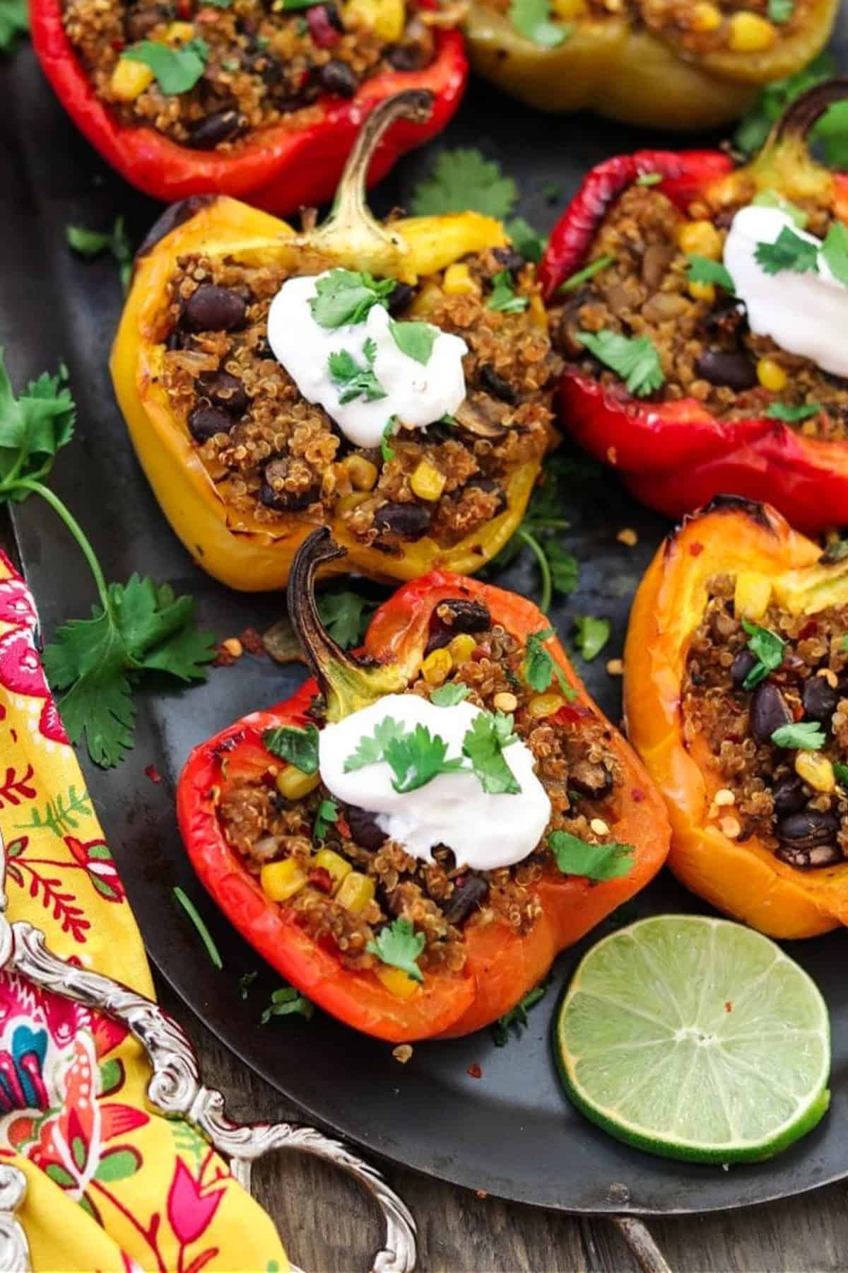 overhead view of quinoa stuffed peppers on a comal.