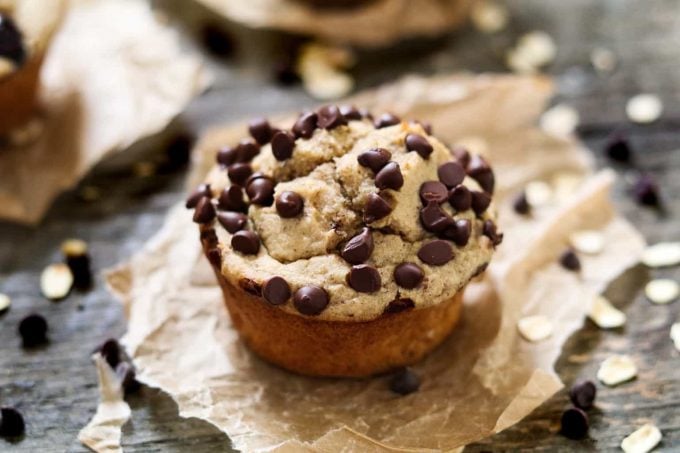 overhead view of protein muffins on a piece of parchment paper. 