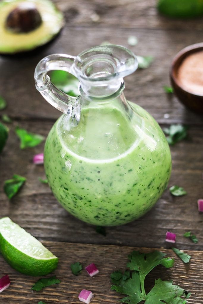 This Avocado Cilantro Lime Dressing is creamy, healthy and bursting with fresh citrusy flavors! It takes minutes to make, plus it's oil-free and vegan too. 