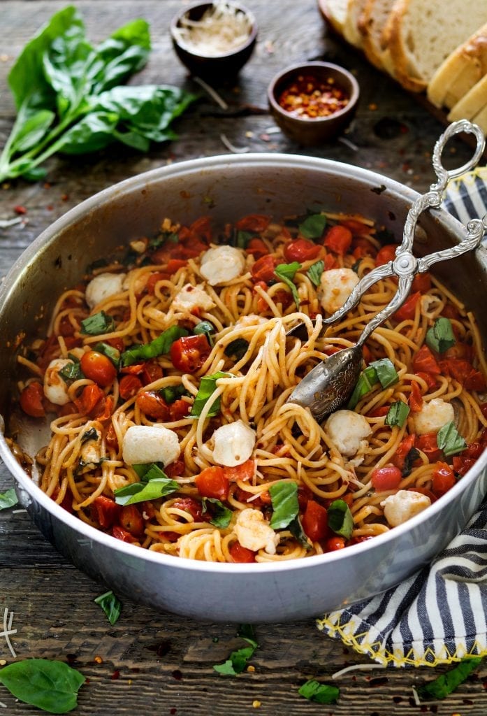 This Vegan Pasta Caprese takes 30 minutes to make and has a fresh taste of summer in every bite. 