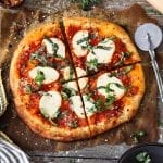 Try out this restaurant-style Vegan Pizza Recipe in the comfort of your own home. It's easy to make and delivers the most delicious crust.