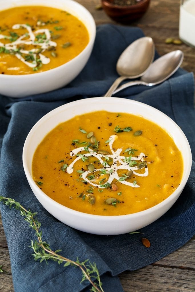 This Vegan Roasted Butternut Squash Soup is the perfect way to welcome fall! It's warm-spiced, hearty and oh-so cozy!