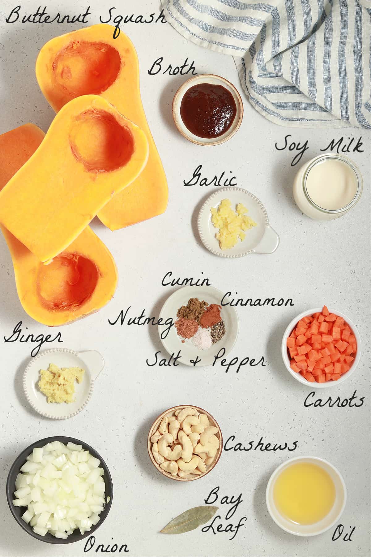 Ingredients to make the soup spread out on a table top.