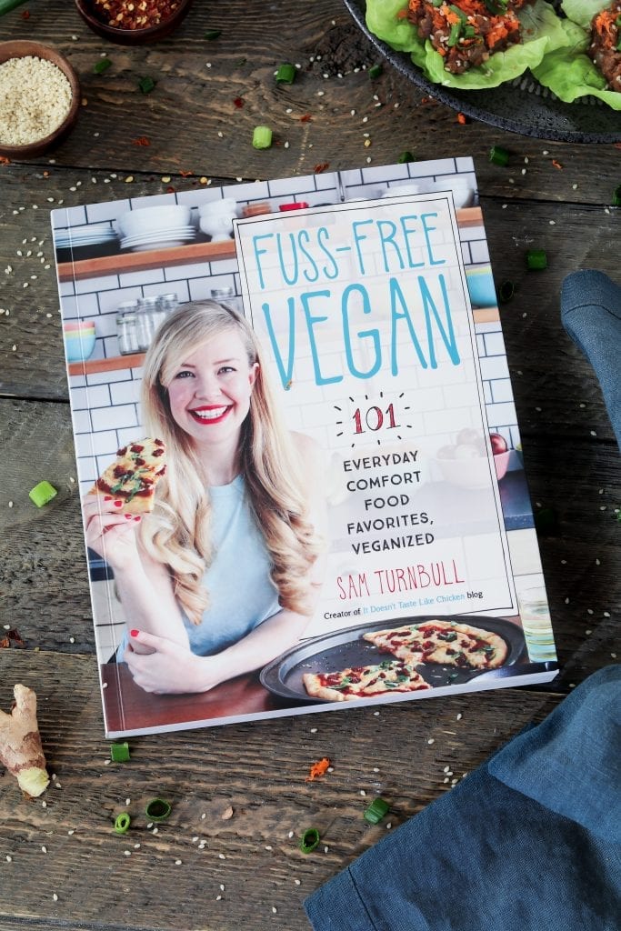 Photo of Fuss-Free vegan cookbook. Vegan lettuce wraps on the side. 