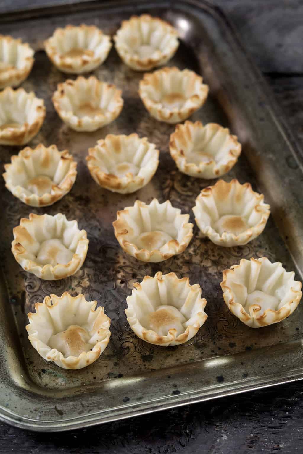 Filo shells on a baking tray.