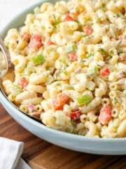 closeup view of fully assembled macaroni salad in a bowl.