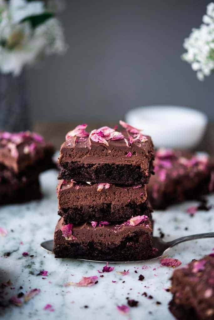 3 chocolate brownies in a collage for vegan valentine's day roundup.