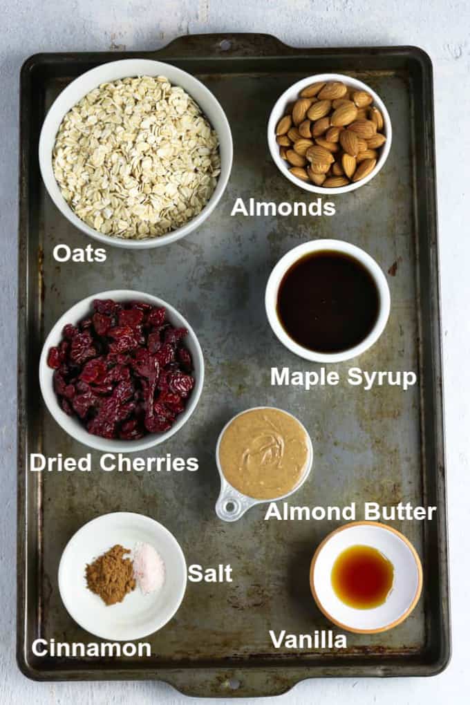 Baking sheet of ingredients to make vegan granola recipe. 