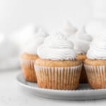 vegan vanilla cupcakes on a plate.