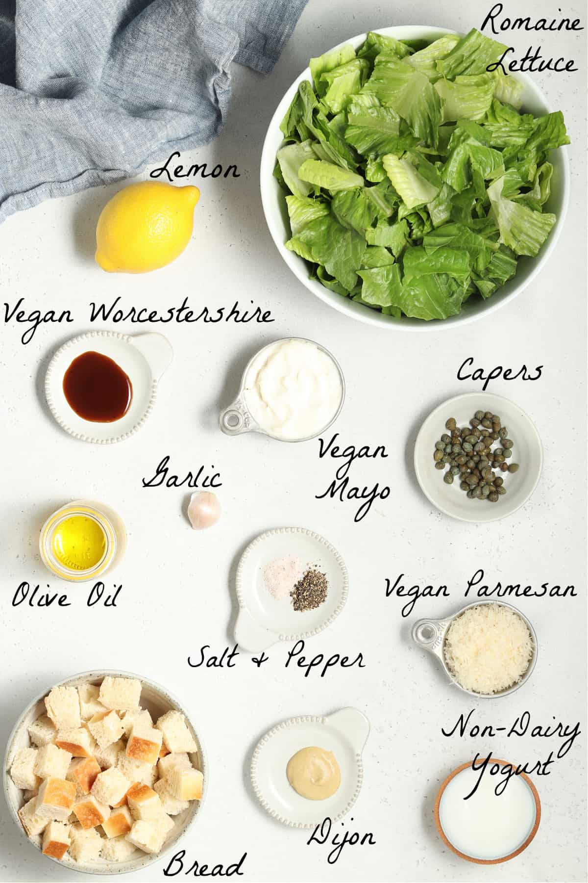 All the ingredients to make the salad recipe on a table top. 
