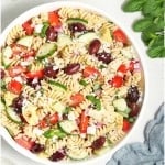 close up view of Mediterranean Pasta Salad in a white bowl.
