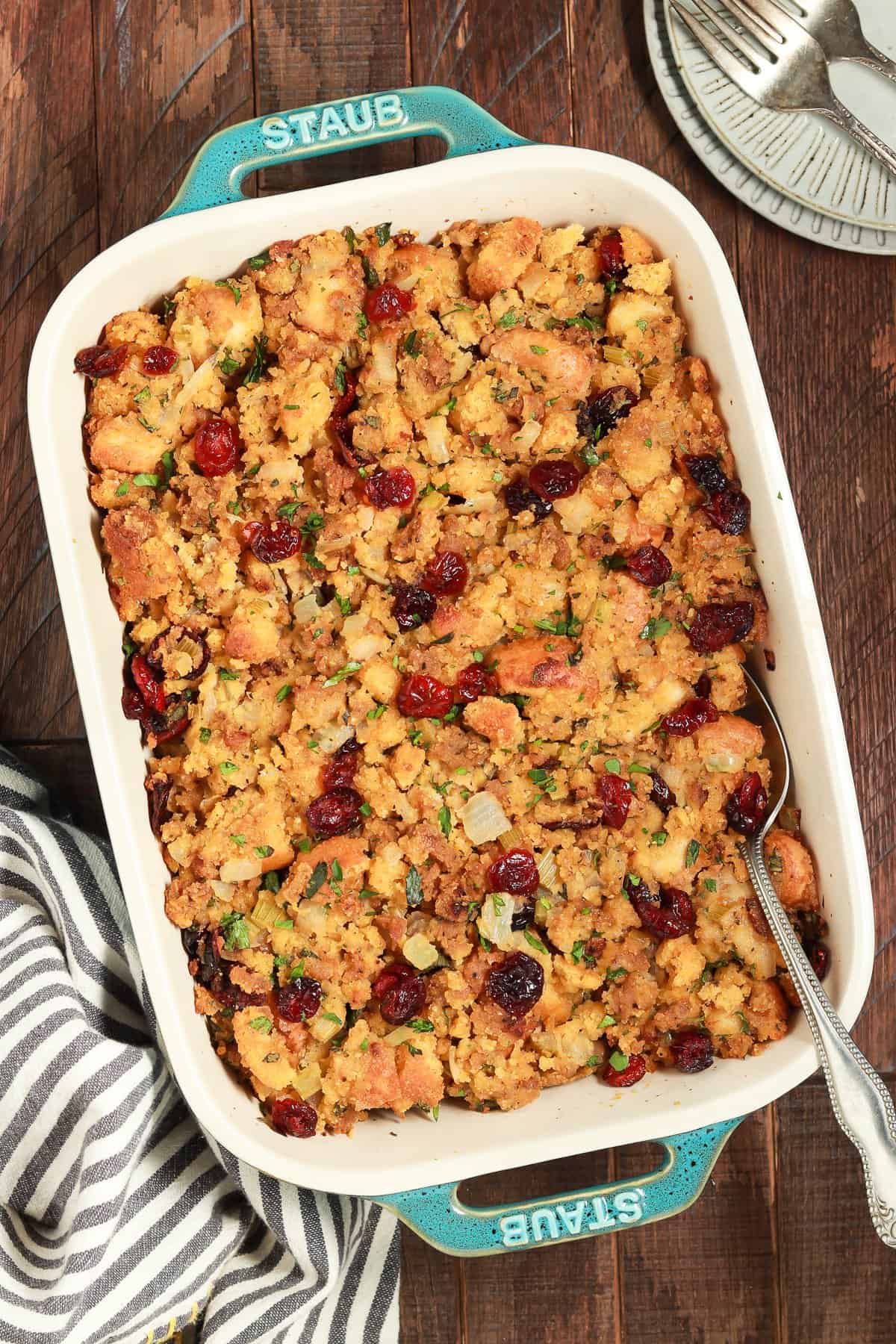 Overhead view of a fully baked vegan cornbread stuffing in a casserole dish.