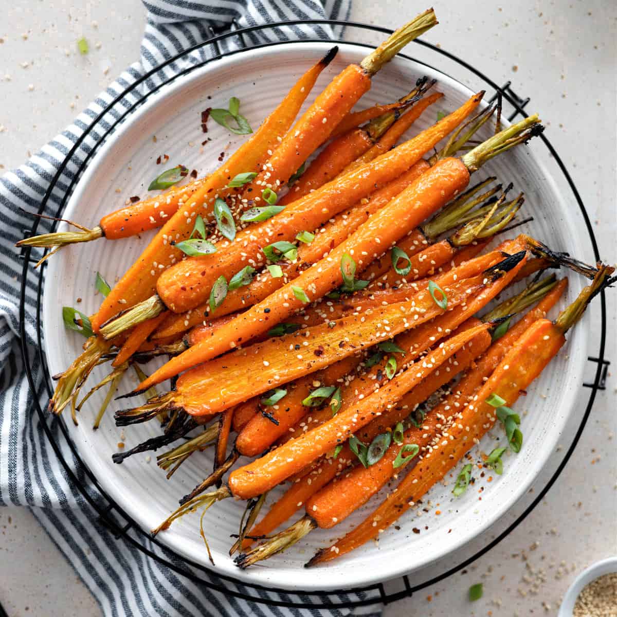 Glazed carrots on a serving dish. 