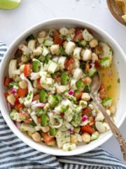 overhead view of vegan ceviche in a bowl with a spoon inside.