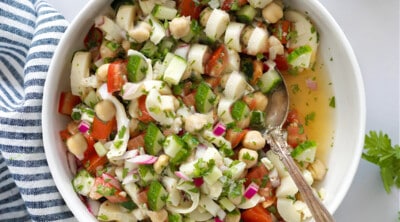 overhead view of vegan ceviche in a bowl with a spoon inside.