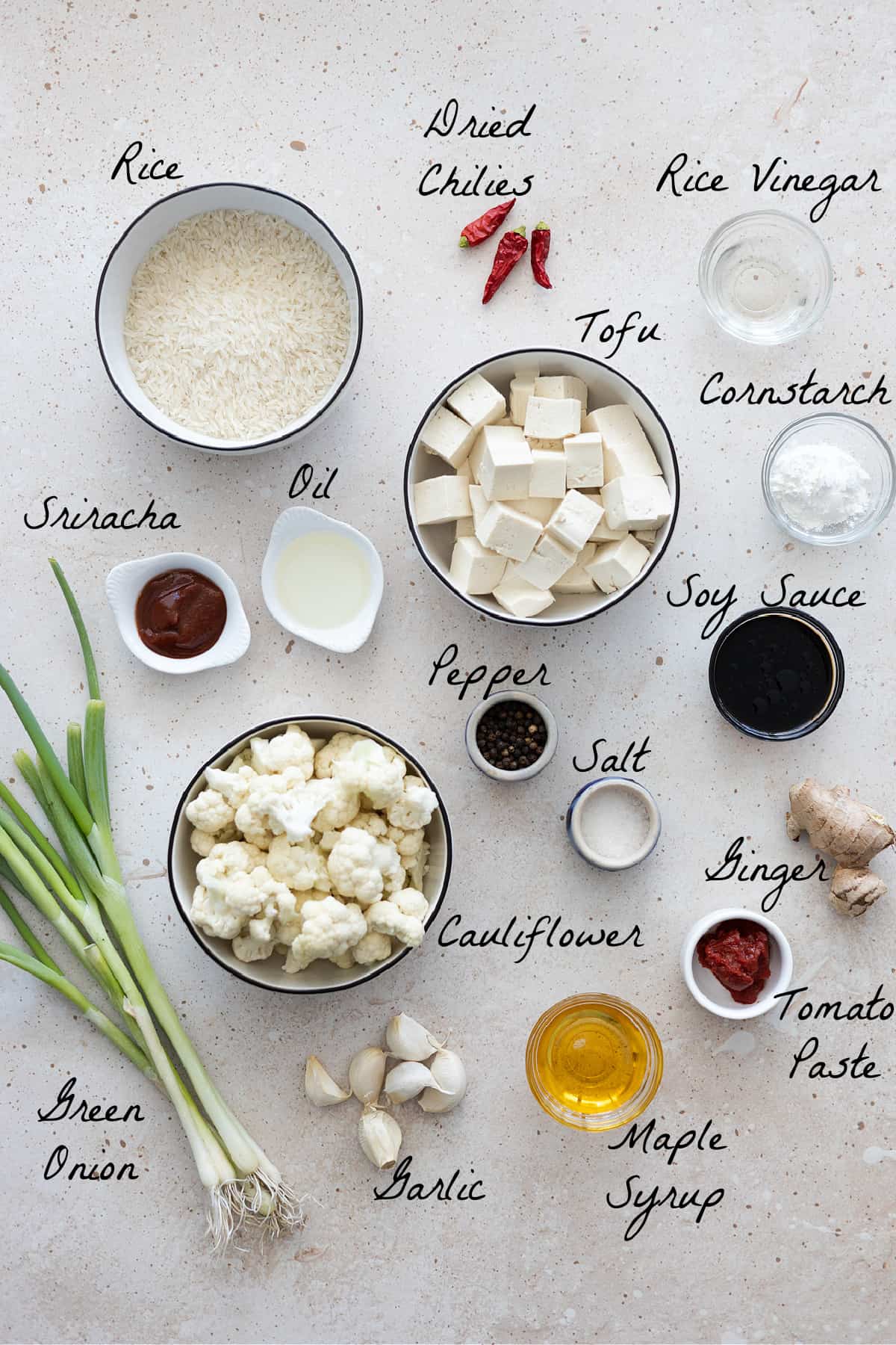 Ingredients to make chili cauliflower on a table top.