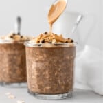 Drizzling peanut butter on chocolate peanut butter overnight oats.
