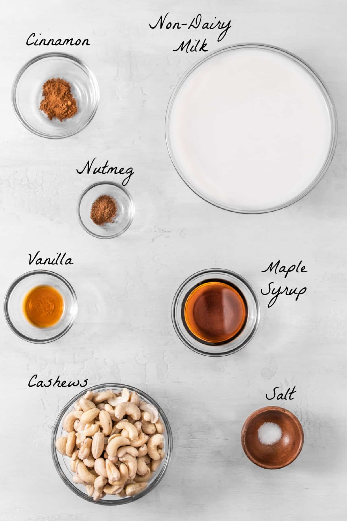 Ingredients to make nog on a stone table top. 