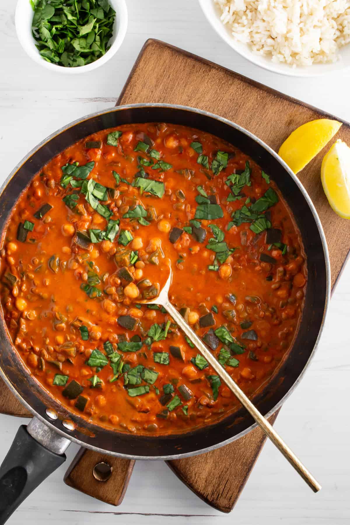 Pan of gochujang chickpeas in sauce.