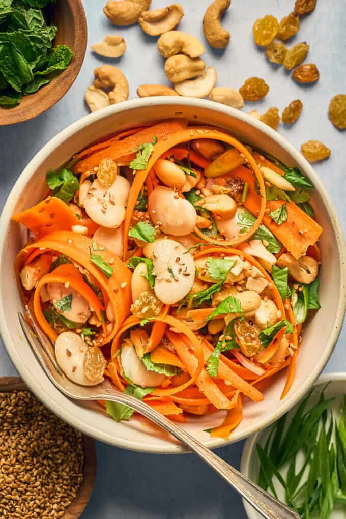 carrot salad in a bowl pin.