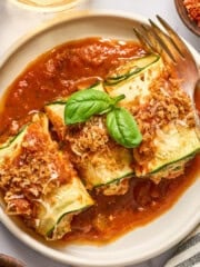 vegan zucchini rollatini on a plate.