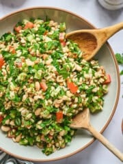 overhead view of barley tabbouleh in a serving bowl.