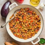 Overhead view of eggplant caponata in a pan.