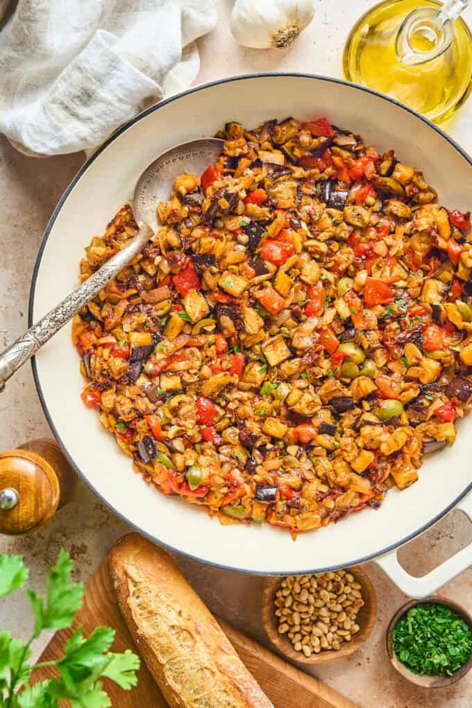 overhead view of caponata in a pan.
