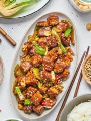 overhead view of kung pao tofu on a serving plate.