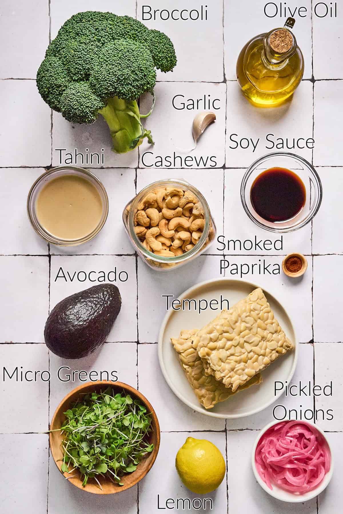 Ingredients to make the salad on a tile table top.