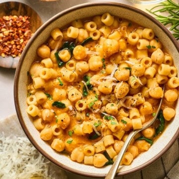 overhead view of pasta e ceci in a bowl.