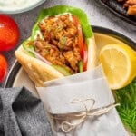 fully assembled vegan gyros on a plate.