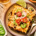 overhead view of a piece of vegan enchilada casserole on a plate.