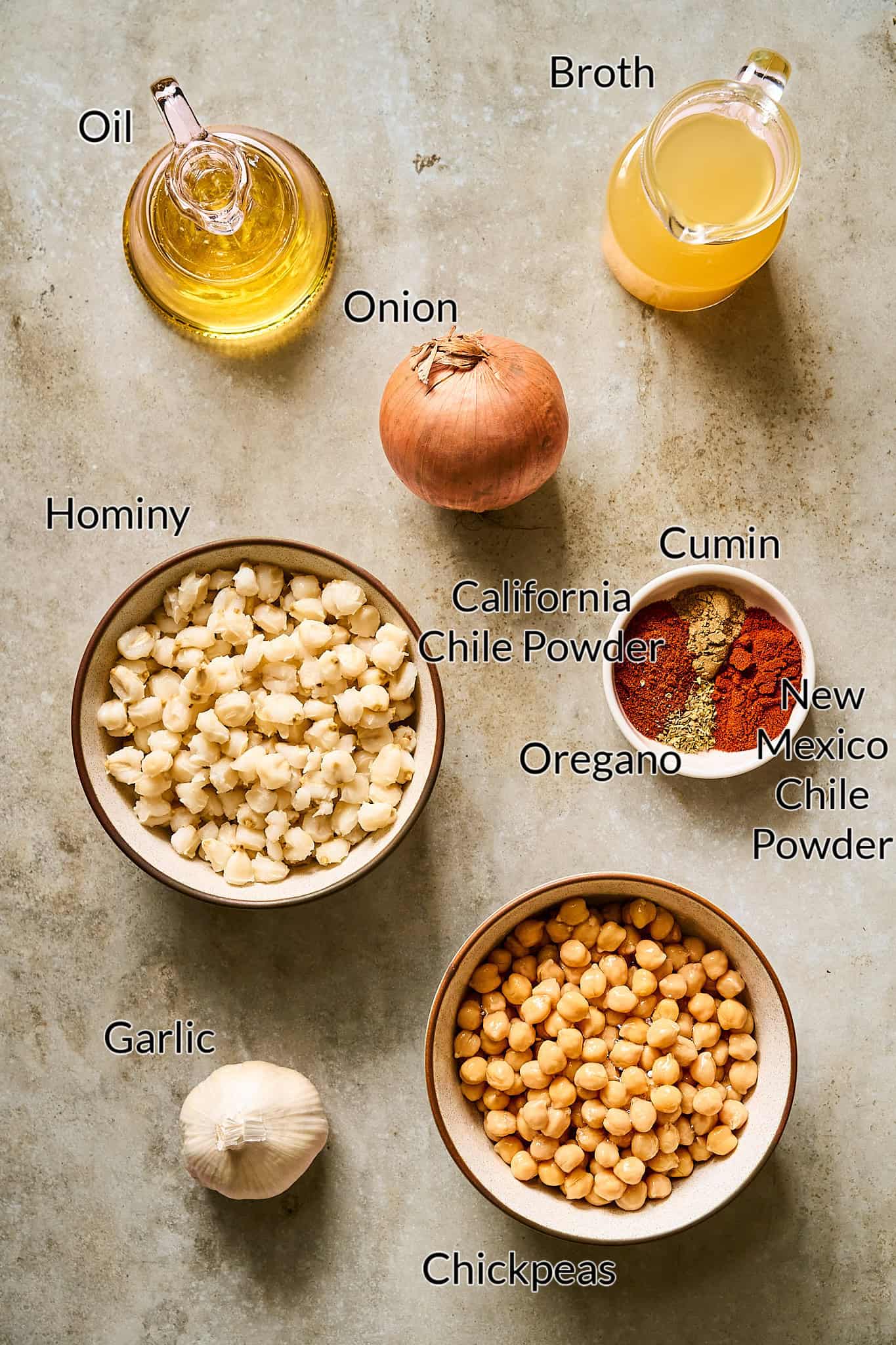 Ingredients to make the pozole rojo on a table.