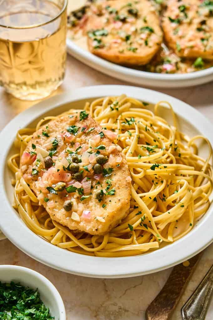 tofu with pasta on a plate.