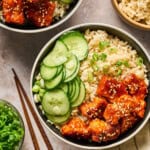 overhead view of gochujang tofu bowls on a table top.