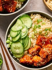 overhead view of gochujang tofu bowls on a table top.