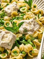 overhead view of vegan lemon ricotta pasta on a serving tray.