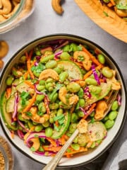 overhead view of edamame salad in a bowl with a fork on the side.