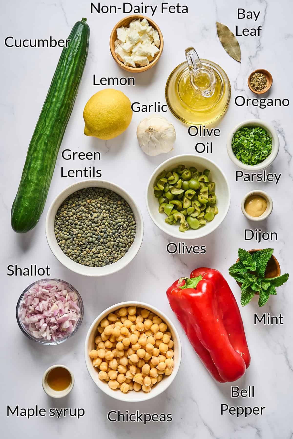 Ingredients needed to make the meal displayed on a stone table top.