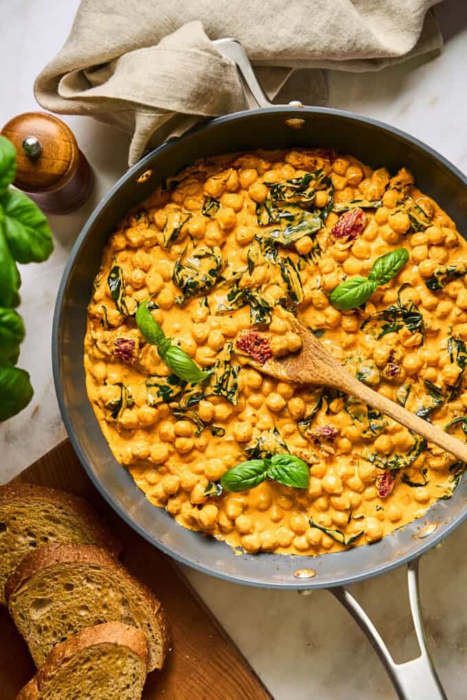 overhead view of garbanzo bean dish in a pan.