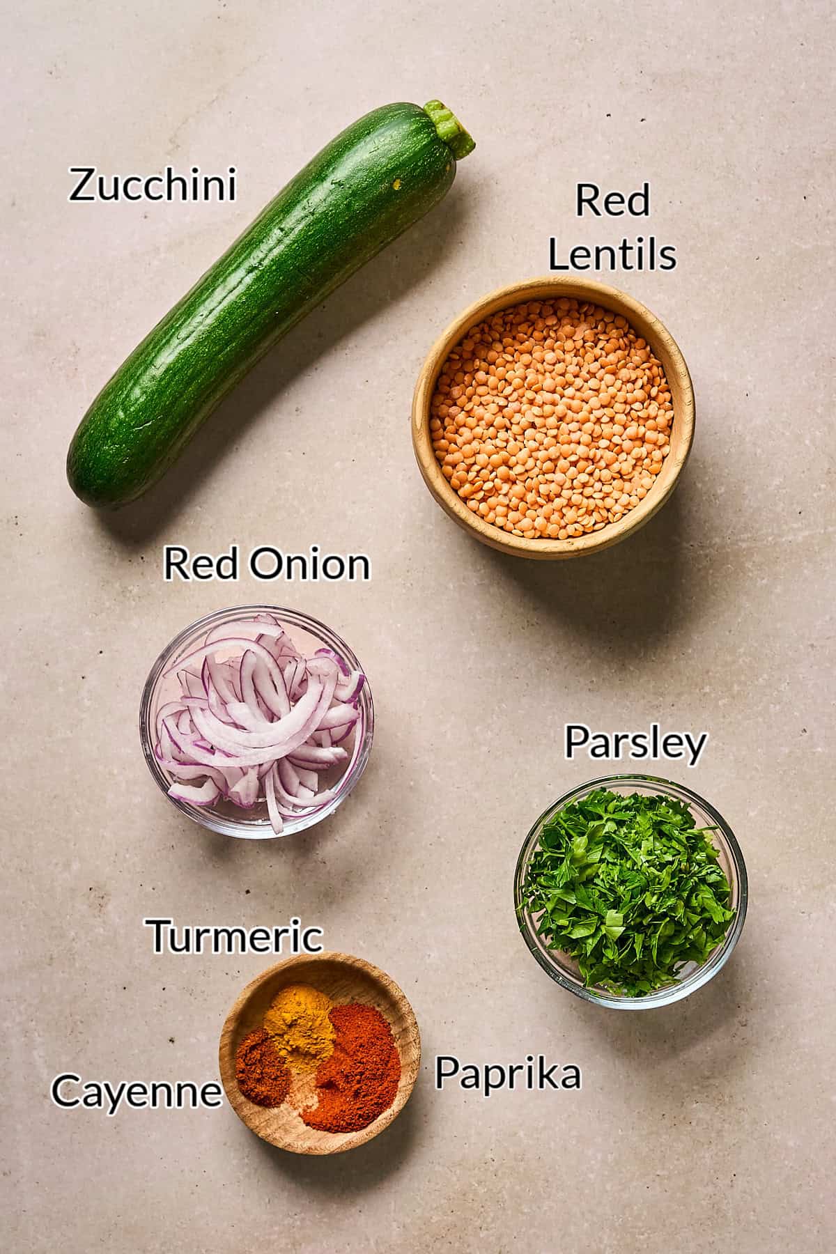 Ingredients to make patties on a stone table top.