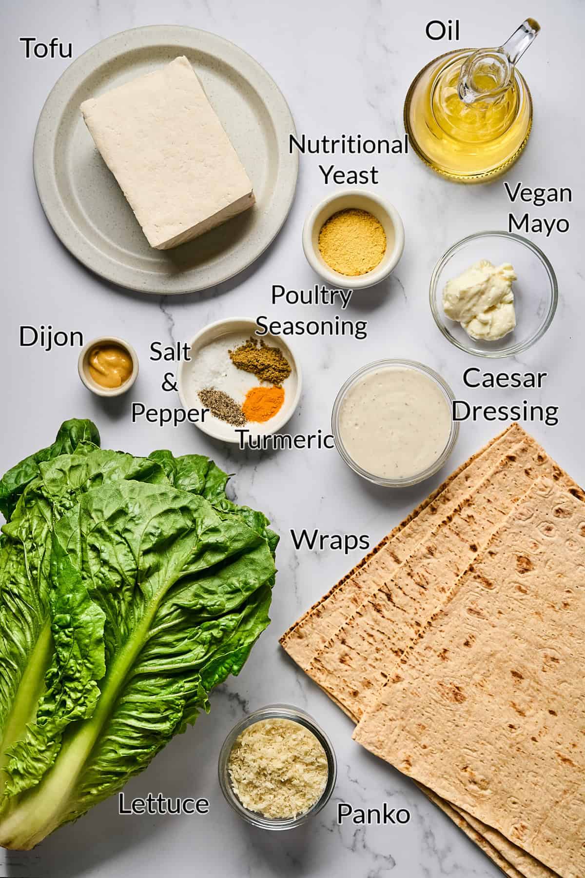 Ingredients to make the meal on a marble table top. 